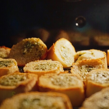 baked goods being baked garlic bread