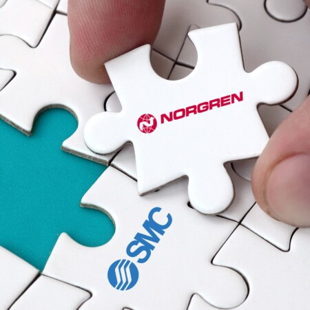 jigsaw puzzle piece with Norgren logo being placed into puzzle