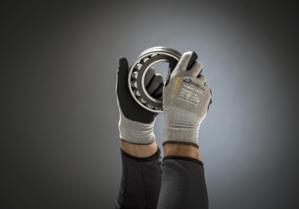 opsial gloves holding a bearing